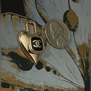 CHANEL Gold and Black Heart Pendant